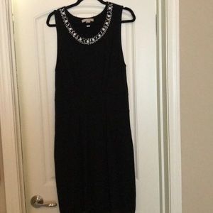 Black sweater dress with beaded collar